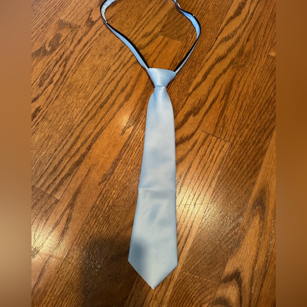 Brand new never worn boys light blue neck tie
